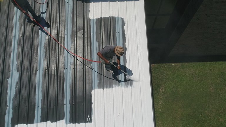 Roof painter at work hobart